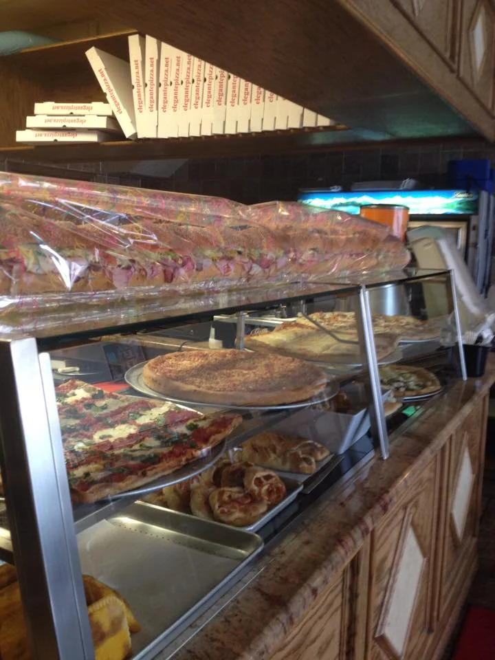 Elegante Restaurant in Far Rockaway will give free pizza pies to government workers all day Tuesday. Facebook photo.