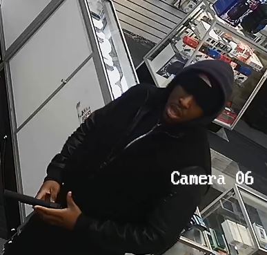 The armed suspect who allegedly robbed a store on Rockaway Boulevard on Jan. 19. Photo courtesy of the NYPD.