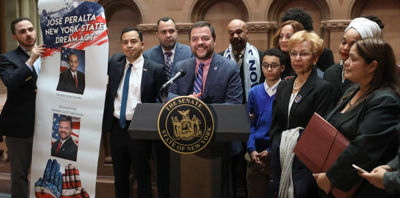 State Senators and immigrants’ rights advocates hail passage of the Jose Peralta DREAM Act. Photo via NY Senate.