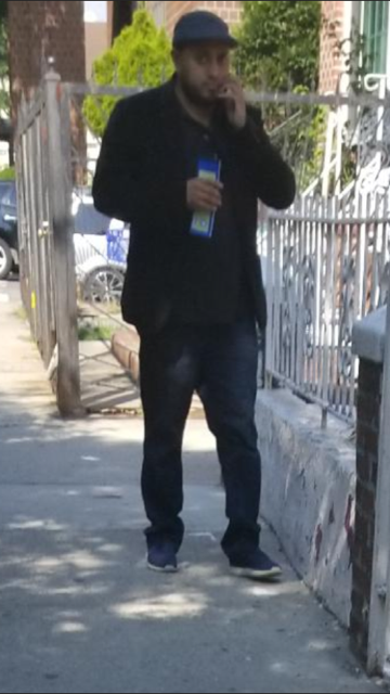 The suspect in a rash of real estate scams in Corona, Elmhurst and Flushing. Photo courtesy of the NYPD.