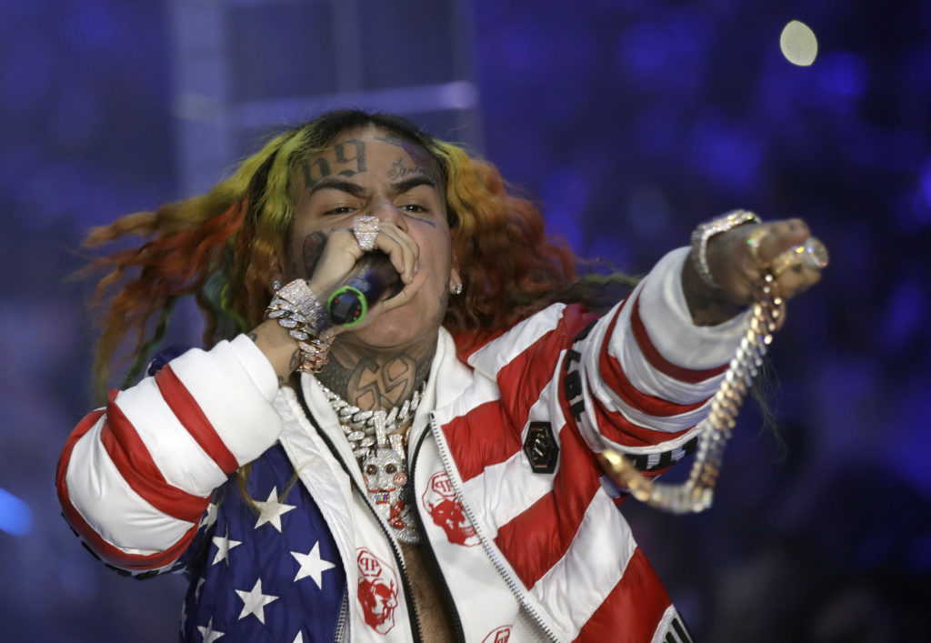 Rapper Tekashi 6ix9ine has admitted to joining a violent gang in New York city and is pleading guilty to multiple felonies.AP Photo/Luca Bruno, File.