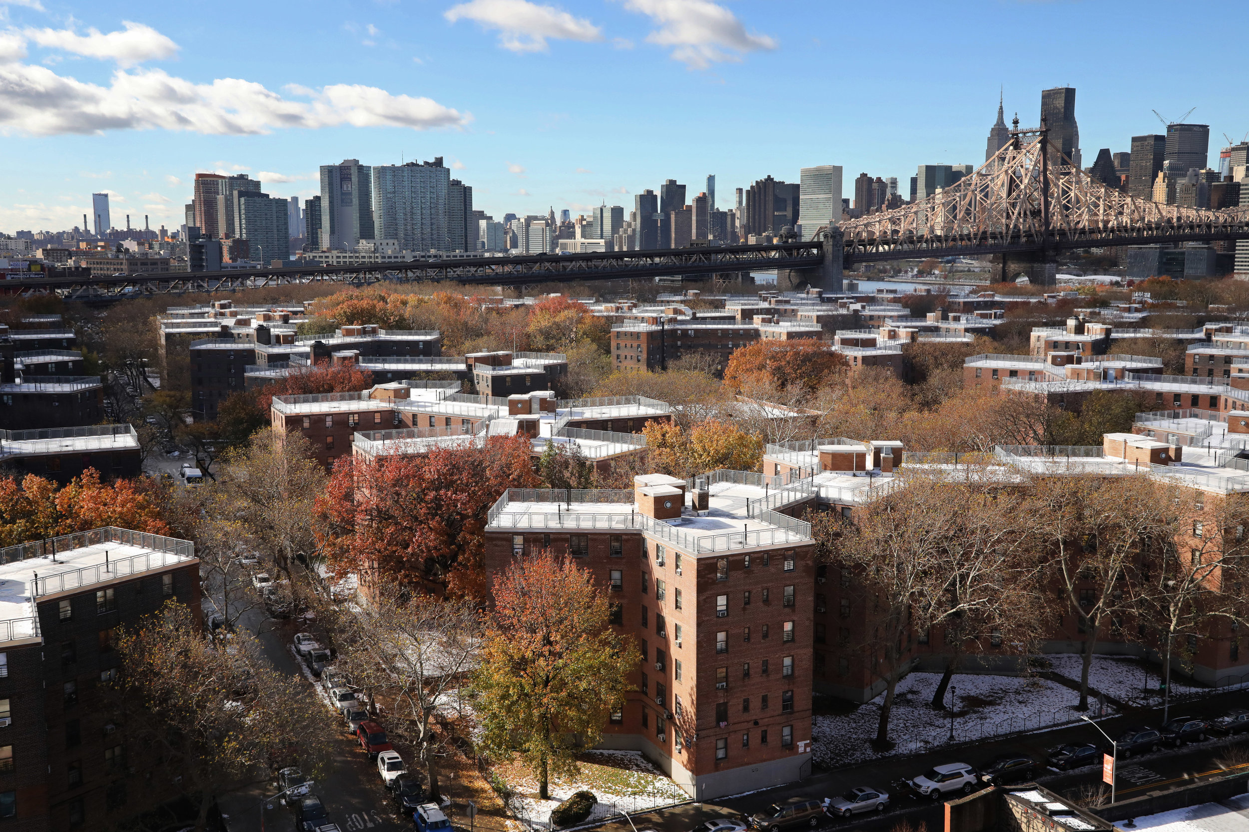 The Queensbridge Houses and the Ed Koch Queensboro Bridge sit near the former site of the proposed Amazon project. Experts analyzing the e-commerce giant's sudden cancellation of plans to build a massive headquarters said Amazon's decision to walk away could scare off other tech companies considering moving to or expanding in the city. AP Photo/Mark Lennihan, File.