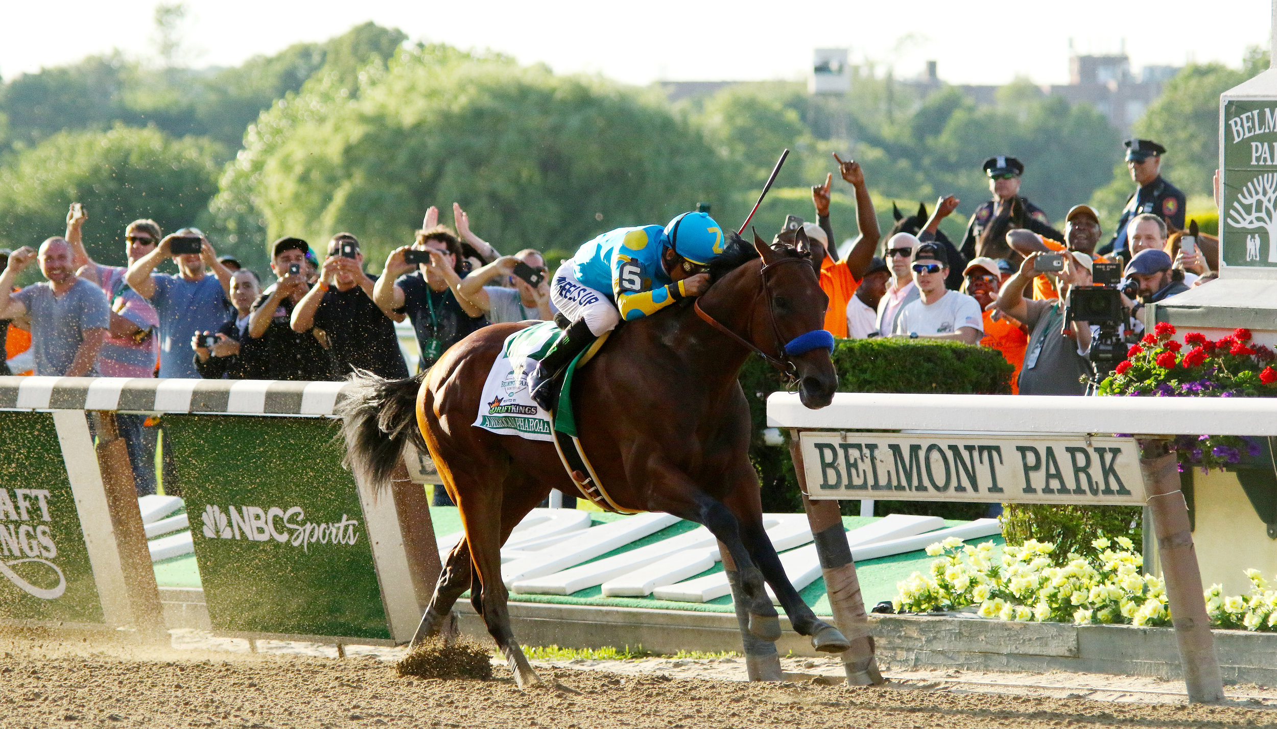 American Pharoah races to Triple Crown victory in the 2015 Belmont Stakes in Belmont Park near the Queens border. The site could host a new stadium for the New York Islanders, along with a massive mall and hotel. Photo by Mike Lizzi.