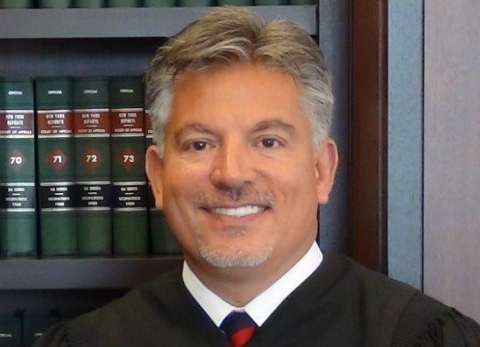 Supreme Court Criminal Term Administrative Judge Joseph Zayas and Queens District Attorney Richard A. Brown earned praise from Chief Judge Janet DiFiore during her annual State of the Judiciary Address. Photos courtesy of NY Courts and the Queens DA’s Office.