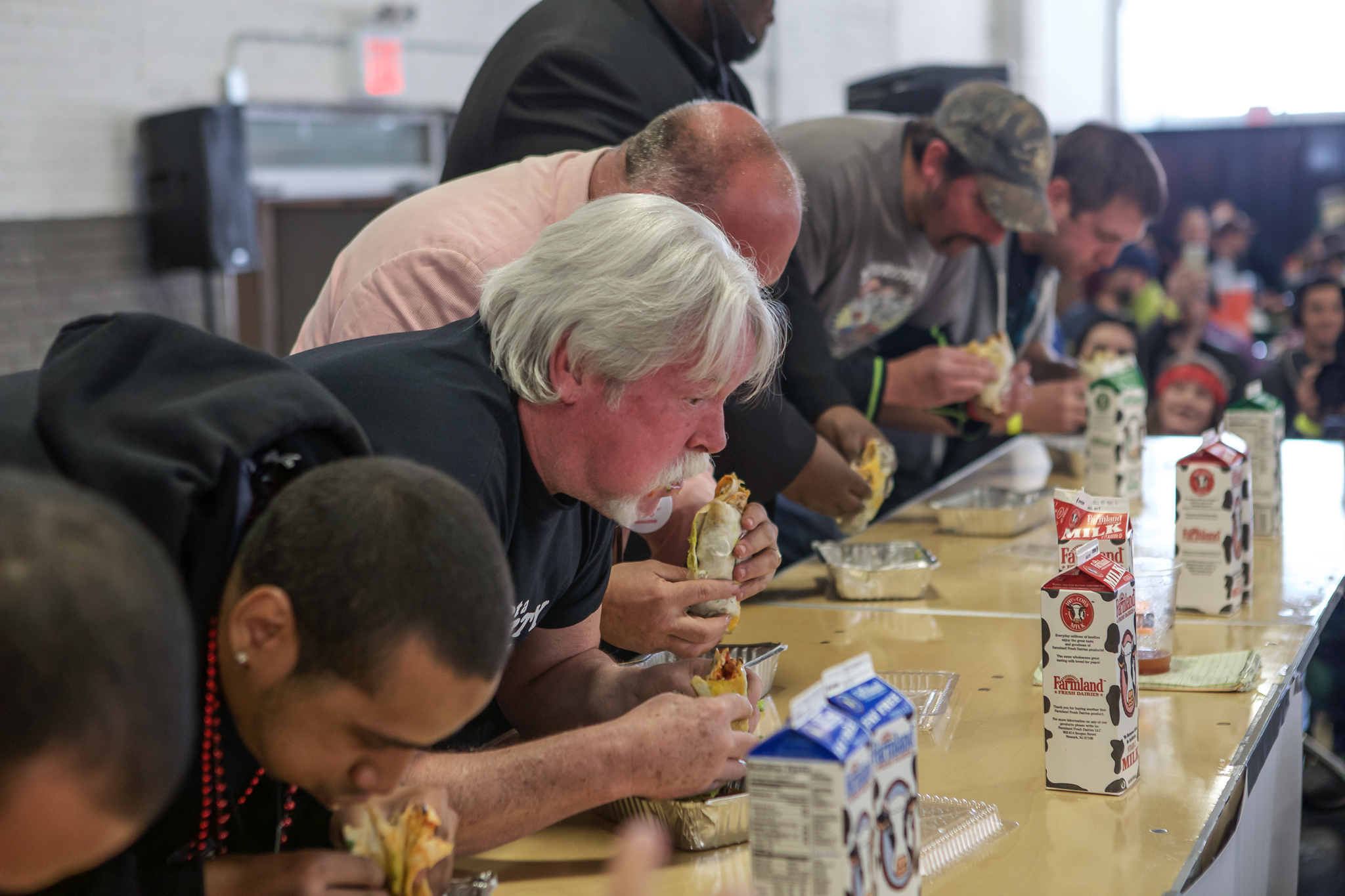 Competitors scarf spicy tacos and picante pizzas. Photo courtesy of High River Sauces.