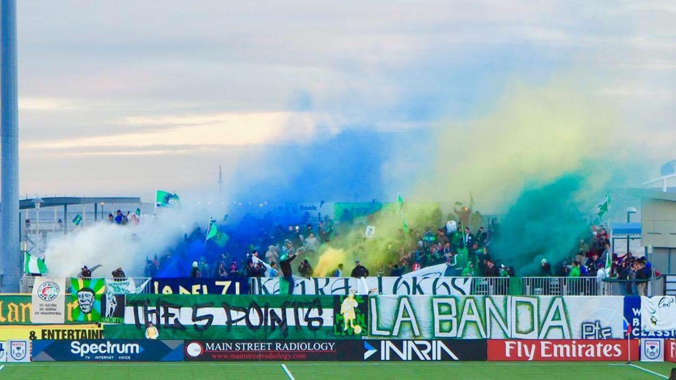The Cosmos’ 5 Points supporters celebrates their beloved club. Photos courtesy of Nicholas Alexandrakos