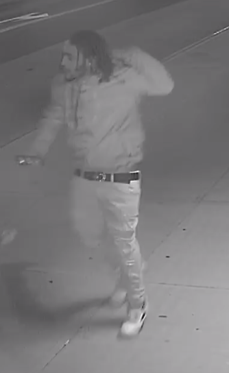 Surveillance images of one of the suspects wanted for allegedly robbing a man in Sunnyside. Photos courtesy of the NYPD.