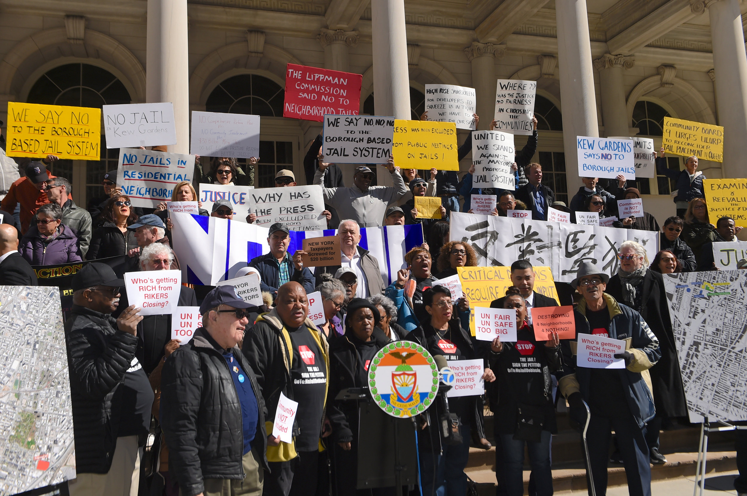  Residents of Kew Gardens demonstrated at City Hall, alongside residents of other neighborhoods where the city plans to build new jails.    