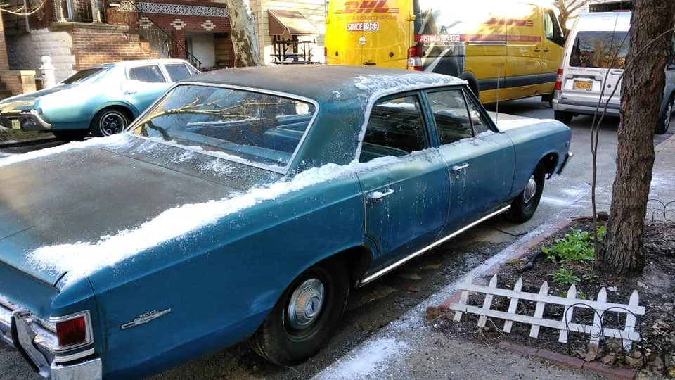 An vintage vehicle parks in Ridgewood. Photos courtesy of Illiterate Scholar.