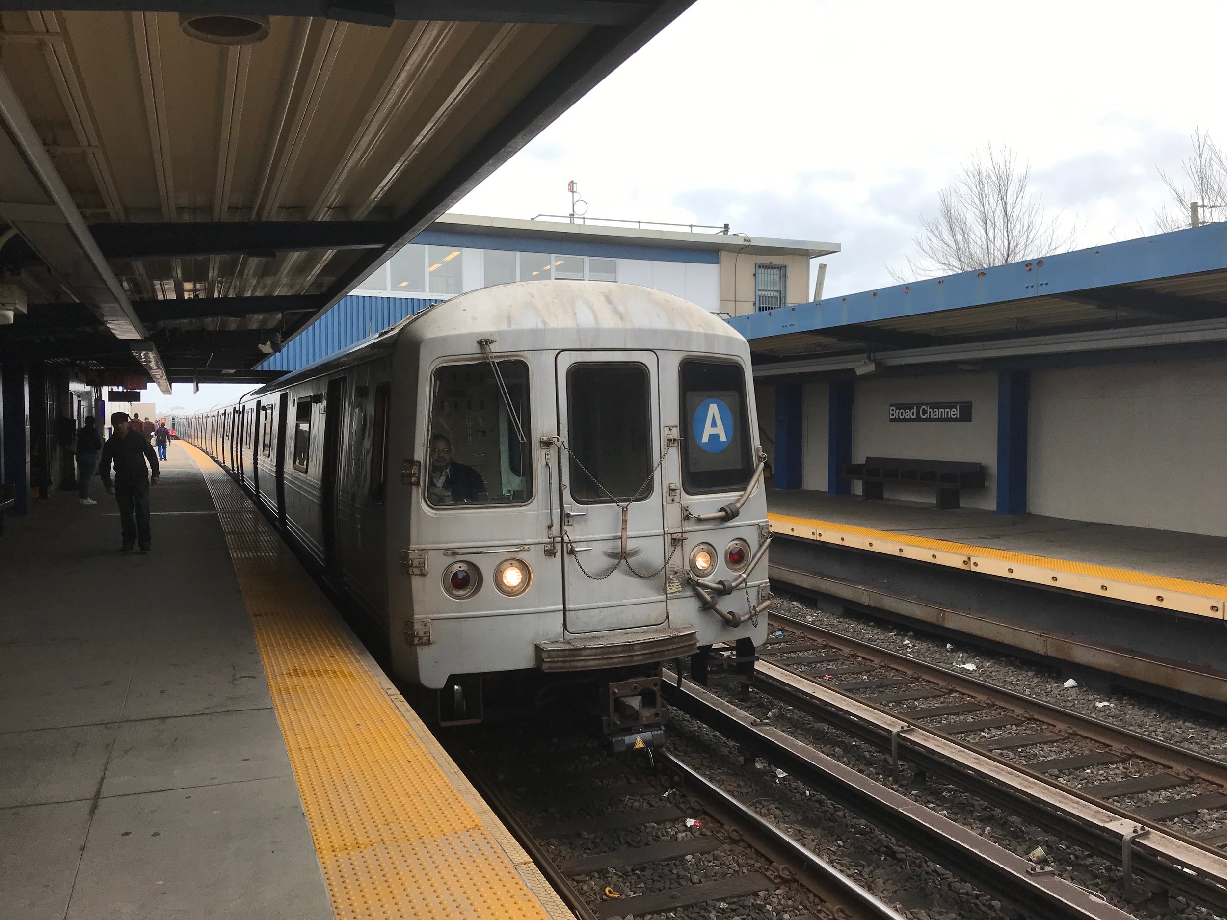 A conductor operates the A train in Breezy Point. Eagle photo by Jonathan Sperling.