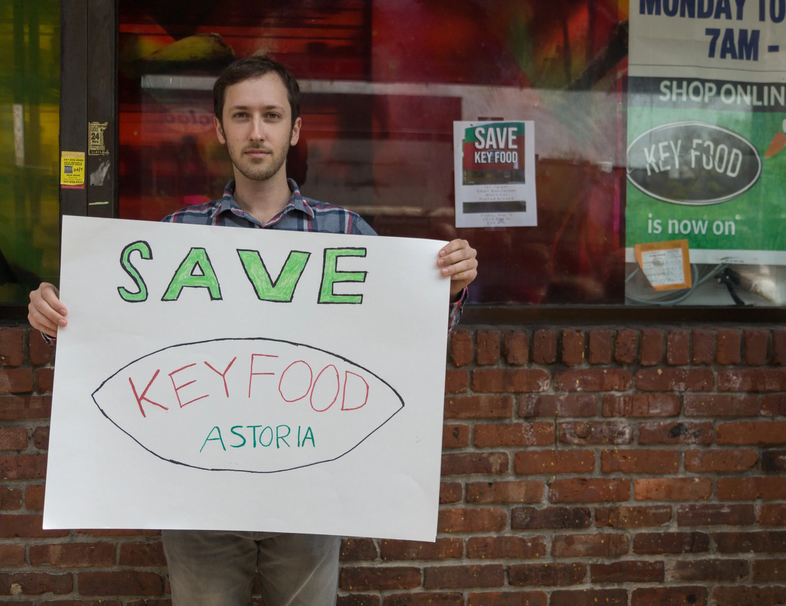 Astoria residents like Jesse Cerrotti say they want to save the 31st Street Key Food, which is threatened by a planned Target. The store owner said he is willing to share the space with Target. Eagle photo by Jonathan Sperling.