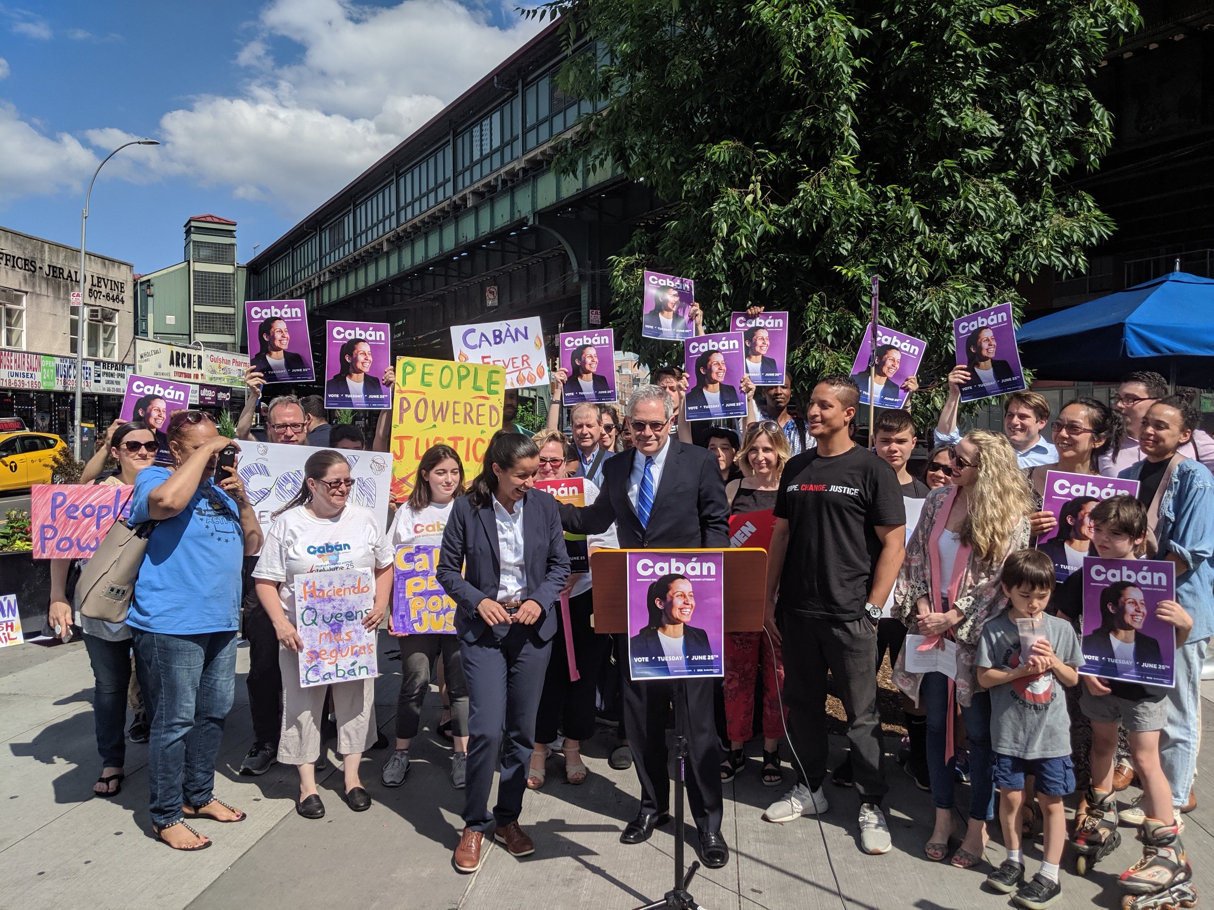 Tiffany Cabán with Philadelphia District Attorney Larry Krasner outside of the Jackson Heights - Roosevelt Avenue subway stop. Eagle photos by Phineas Rueckert.