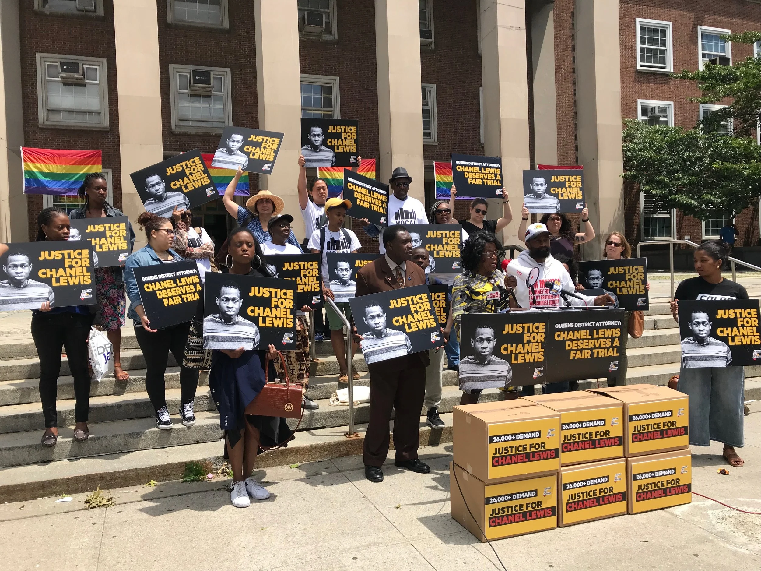 Advocates and the family of Chanel Lewis demonstrate outside Queens Borough Hall Tuesday. Eagle photo by David Brand.