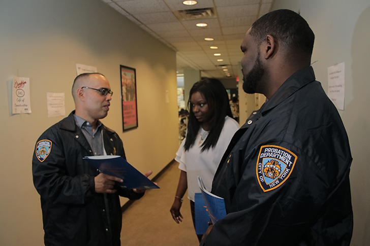 Probation officers at work. Photo courtesy of the Department of Probation.