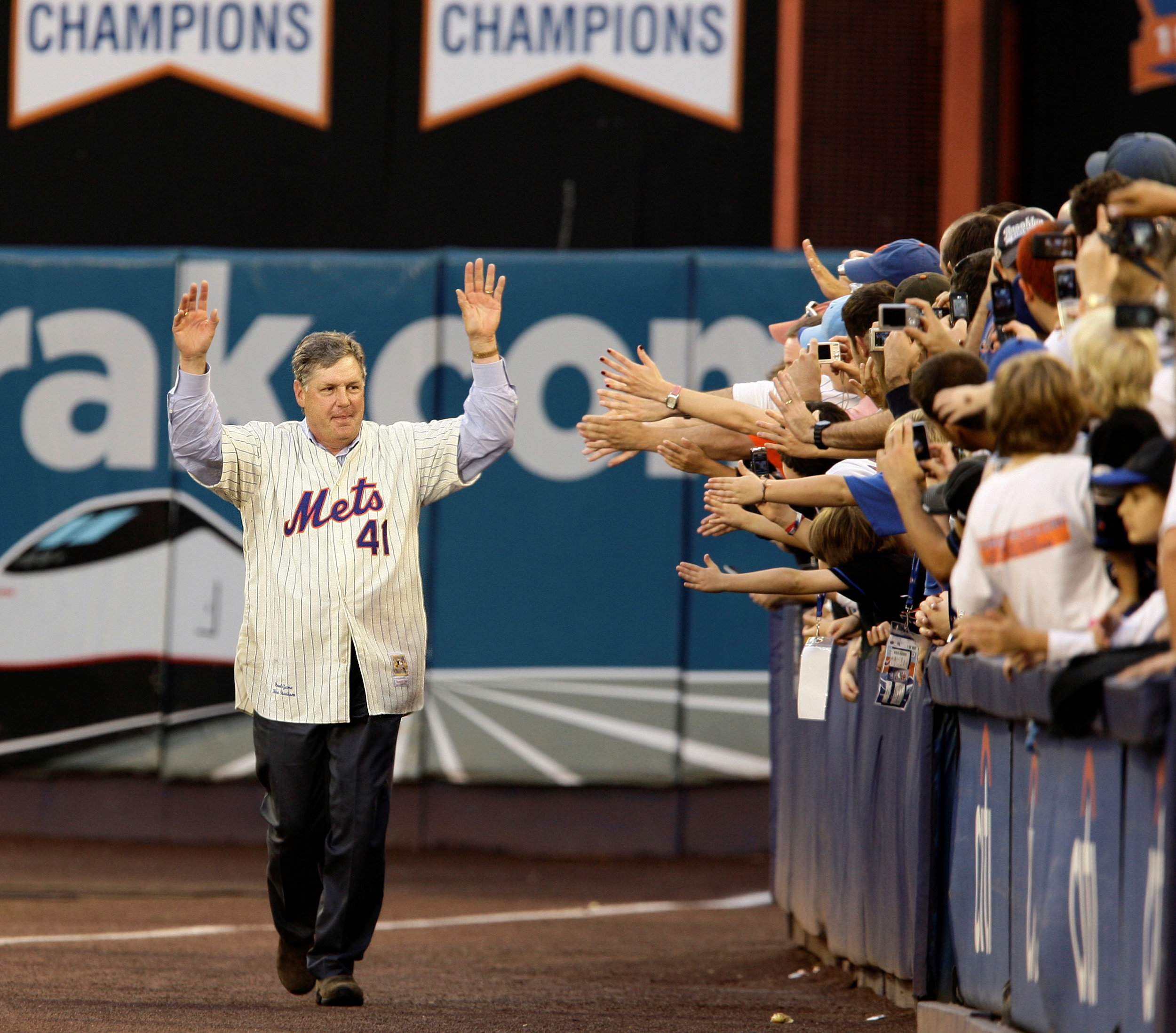 Hall of Fame pitcher Tom Seaver acknowledges the fans after the final game at shea stadium in 2008. AP Photo/Kathy Willens, File.