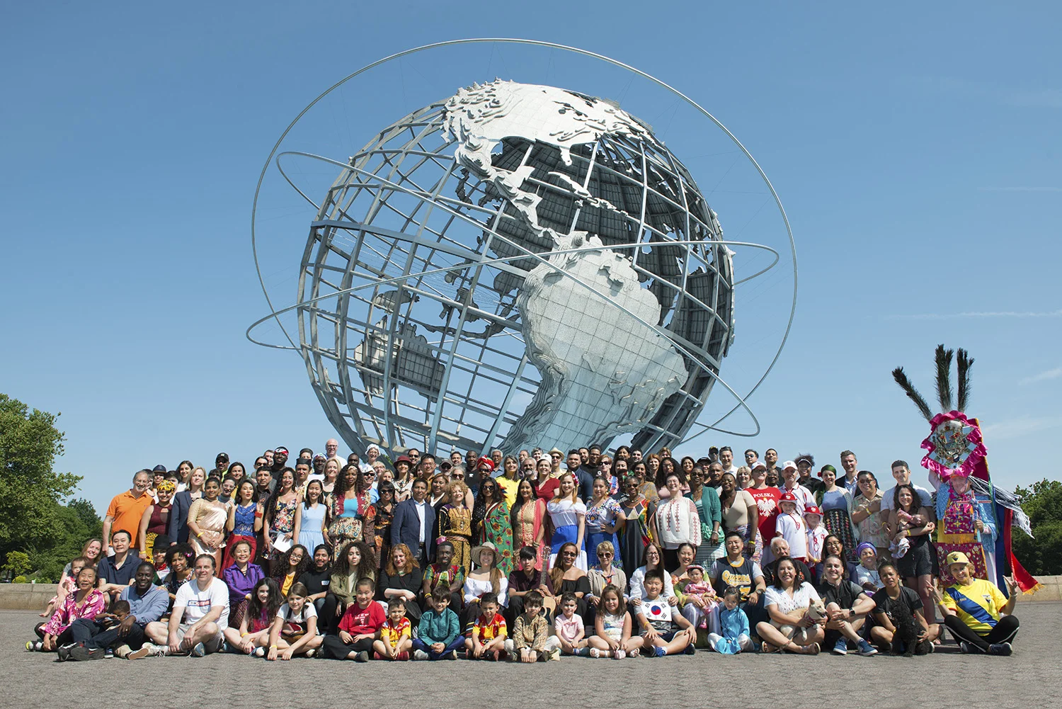 Photographer Jonathan Kane captured the diversity of Queens in this 2018 photo, an homage to his father Art Kane’s famous “A Great Day in Harlem," a 1958 image of legendary jazz musicians. Photo by Jonathan Kane via the QEDC.