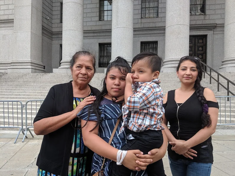 Alma Centeno Santiago’s mother, daughter, son and sister outside federal immigration court in Manhattan. Eagle photo by Phineas Rueckert