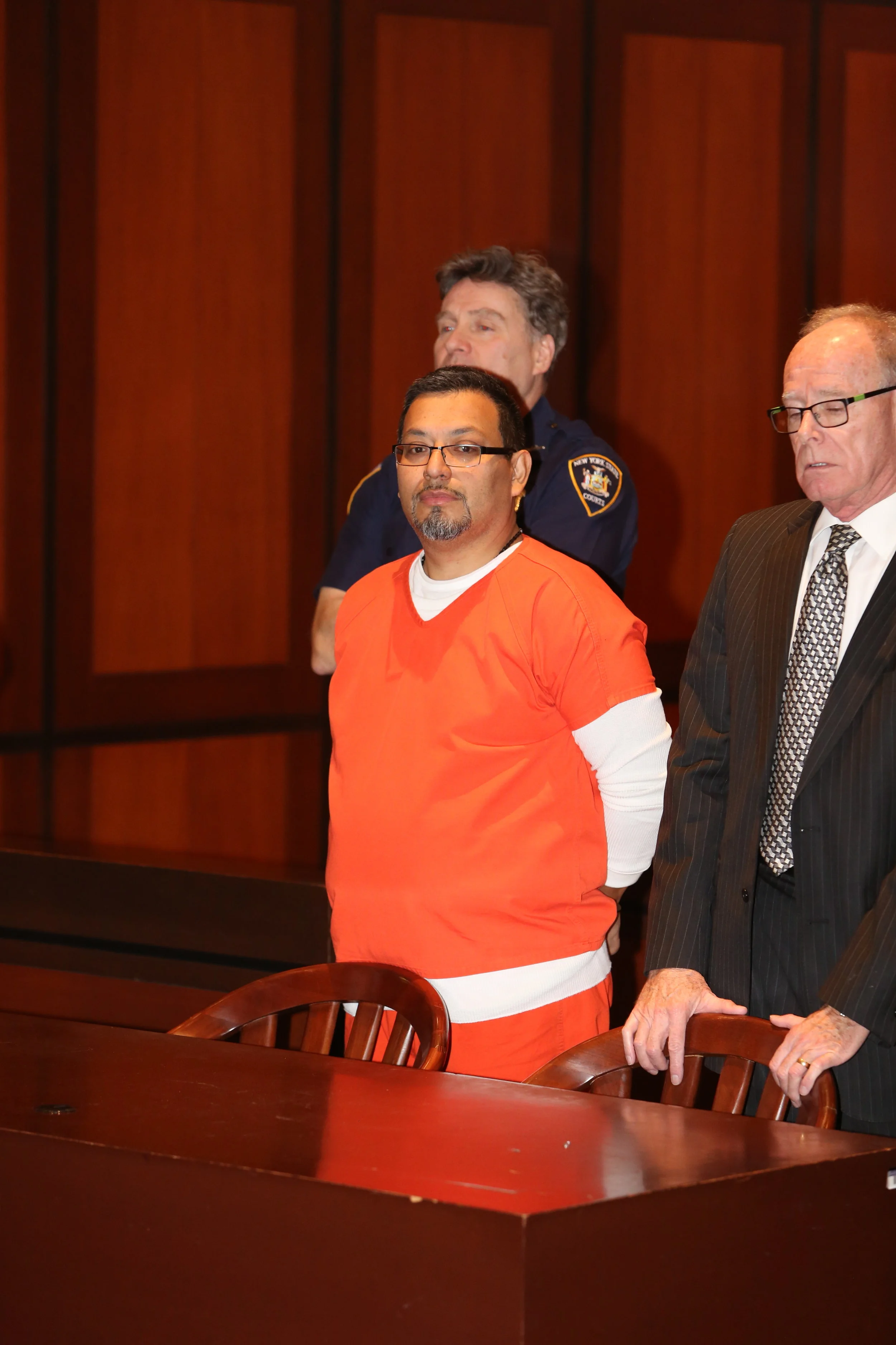 Disgraced NYPD detective sentenced to up to 12 years for running brothel scheme