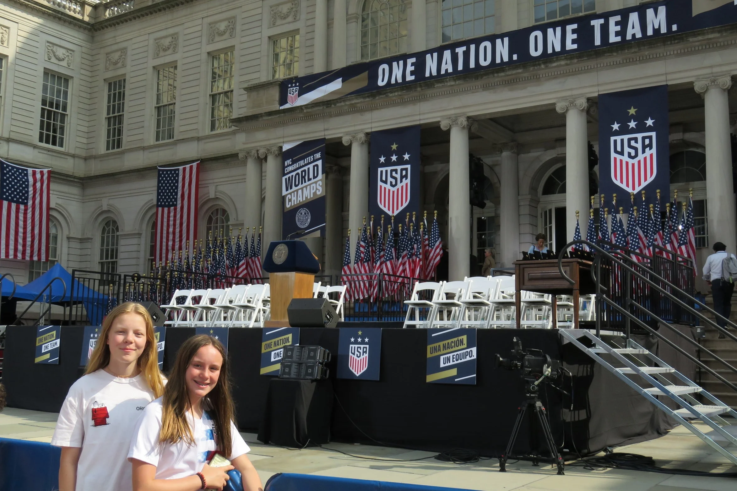 Shannon Gallagher and Katie Porazio, both 12, await the US Womens National Team.