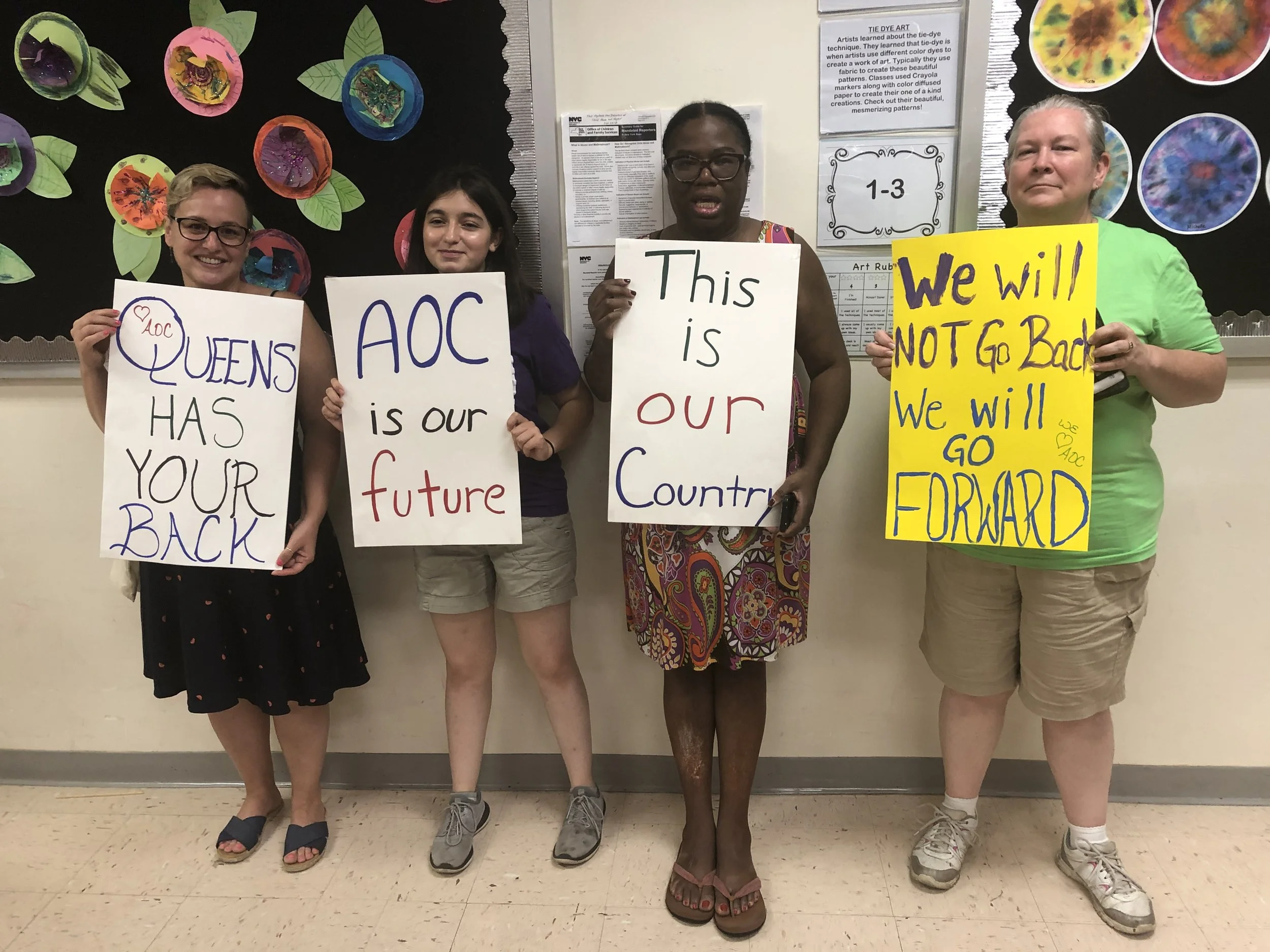 Several AOC constituents and supporters stood on the sidelines of the meeting. Eagle photo by Rachel Vick