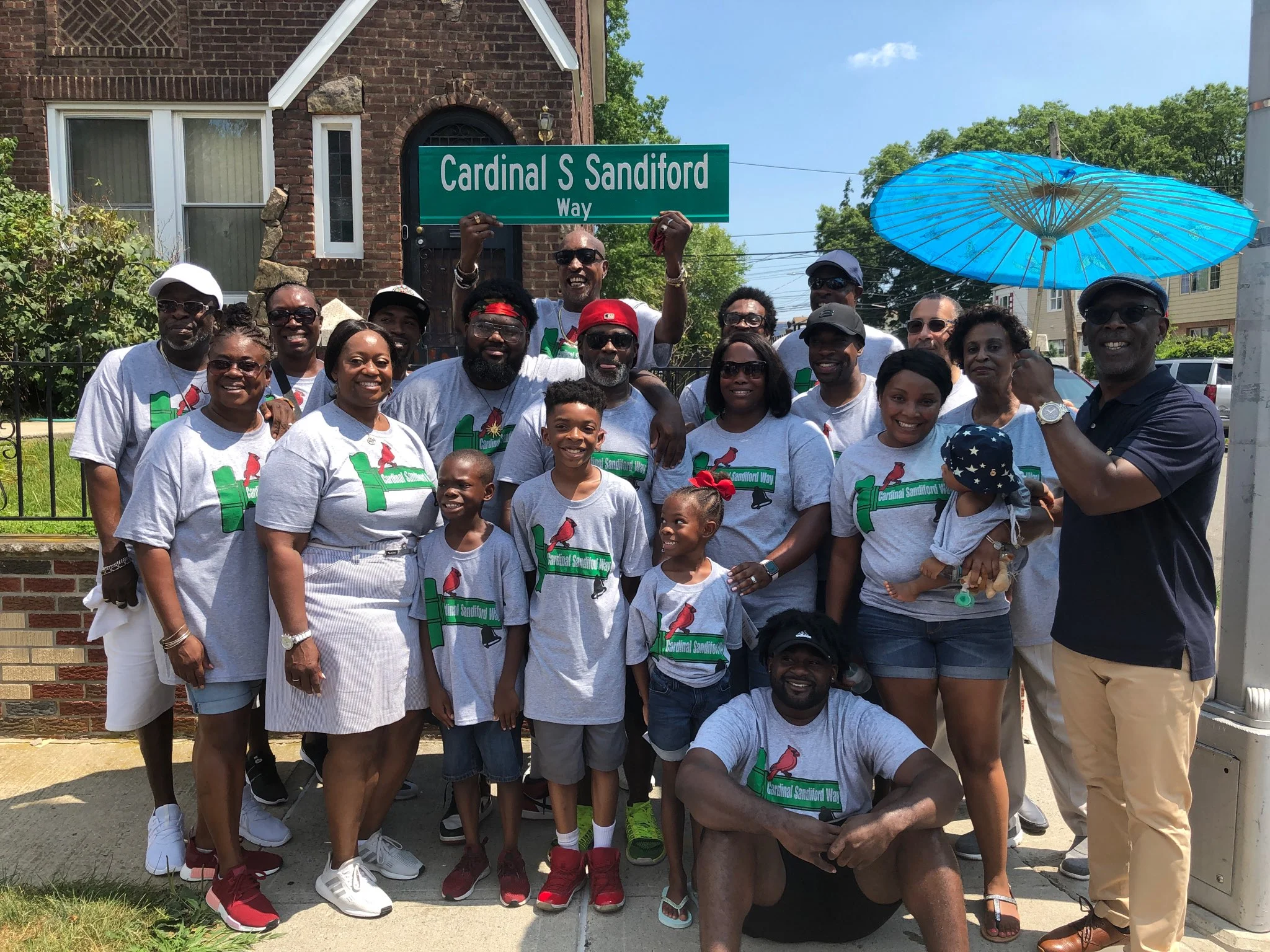 Community leaders, including Councilmembers I. Daneek Miller and Adrienne Adams, attended a street renaming ceremony for late-Community Board 12 member Cardinal Sandiford. Photo courtesy of Miller’s office.