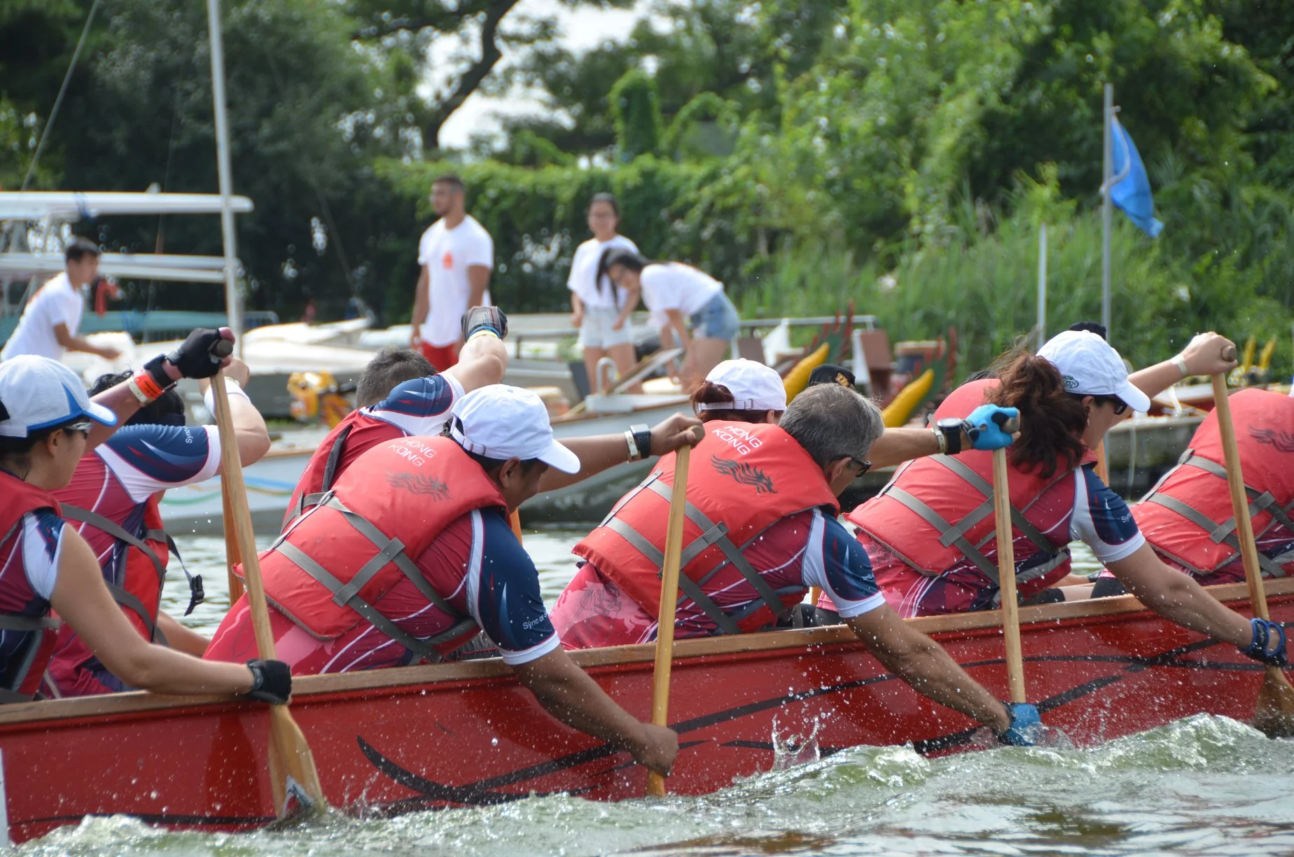 A dragon boat team races during a previous festival. Photo courtesy of Queens EDC.