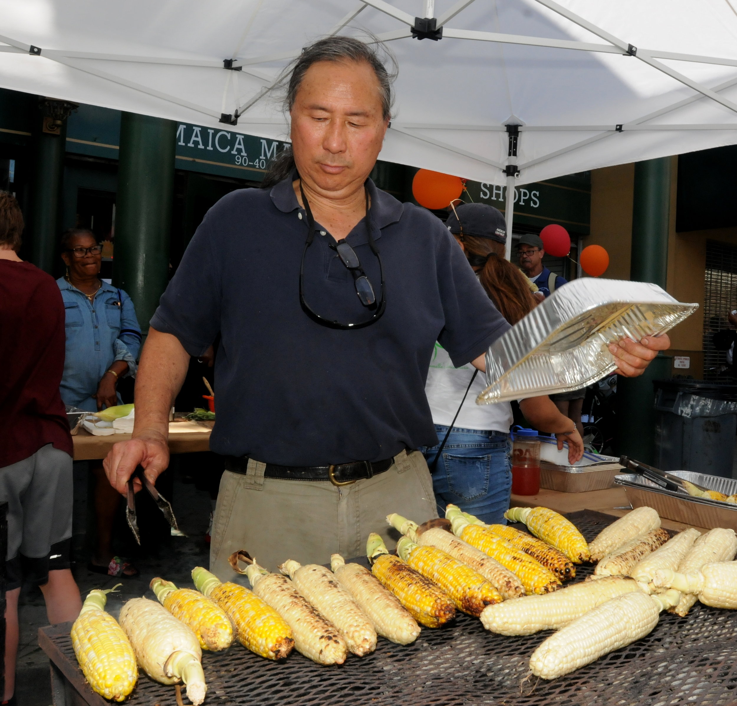  Roastmaster Pono Wong cooks the corn. 