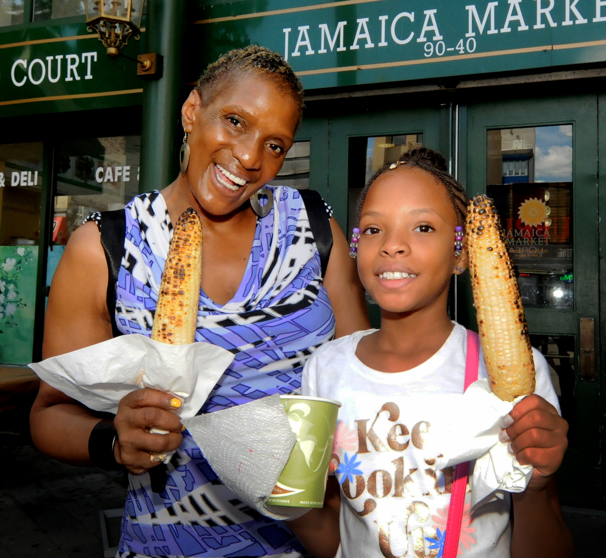  Kimmera Foreman and her granddaughter Kiara McAllister visited Jamaica Market during the annual corn roast. 