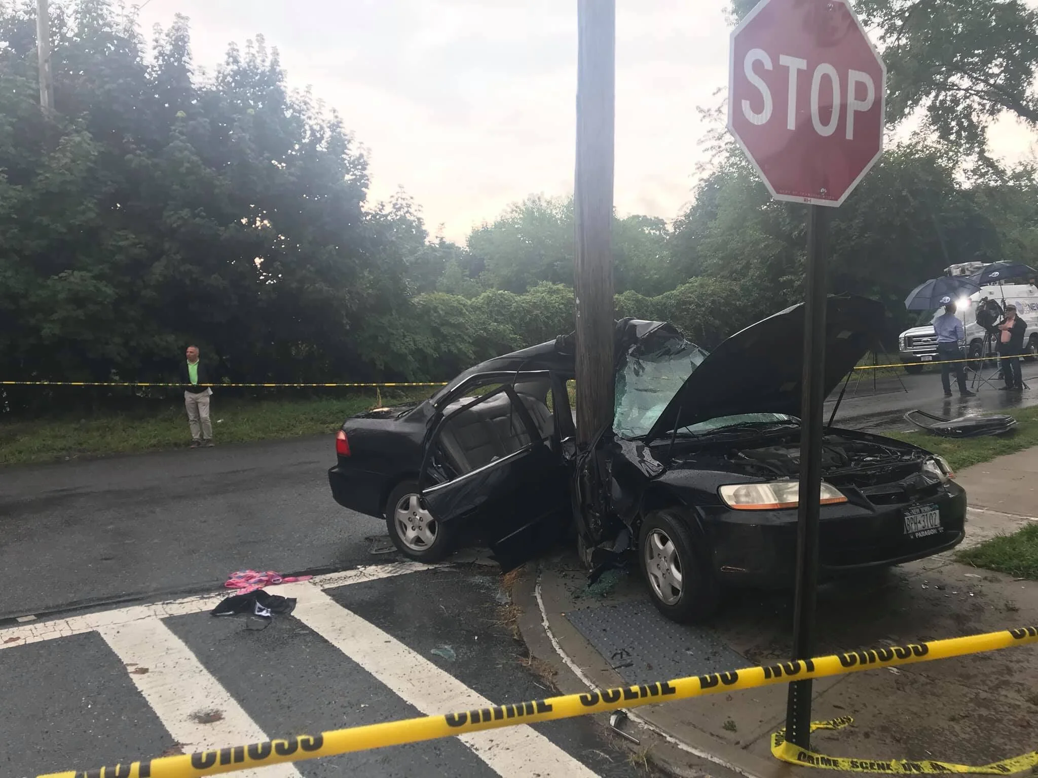Three women injured when their car strikes telephone pole in Middle Village