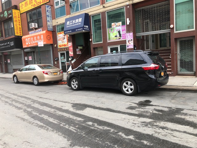 A car owned by Assemblymember Ron Kim routinely parks in no-standing and no-parking zones using a state Assembly-issued parking placard. Photo obtained by the Eagle.