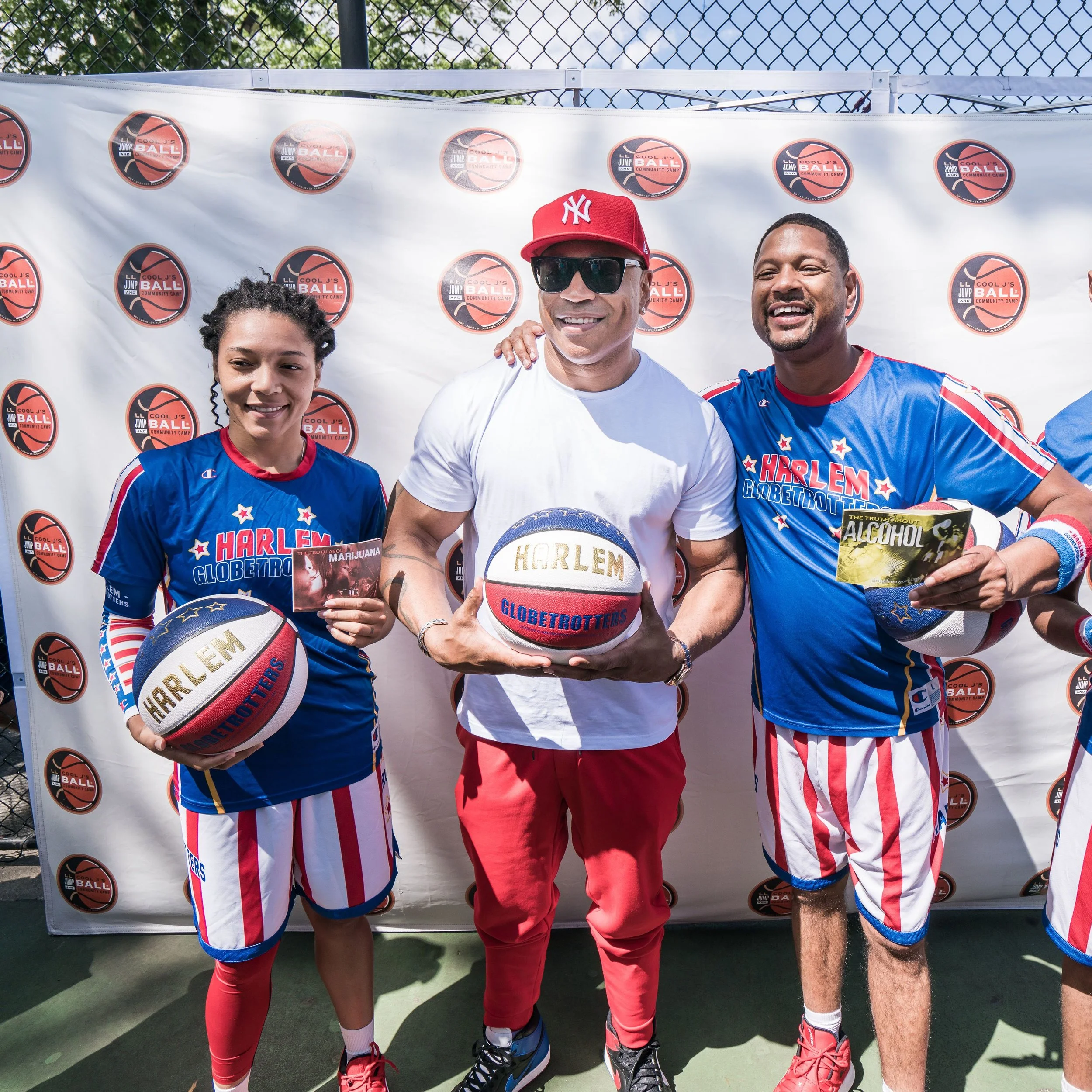 LL Cool J palled around with the Harlem Globetrotters at his charity event last weekend. Photo by Austin Donohue.