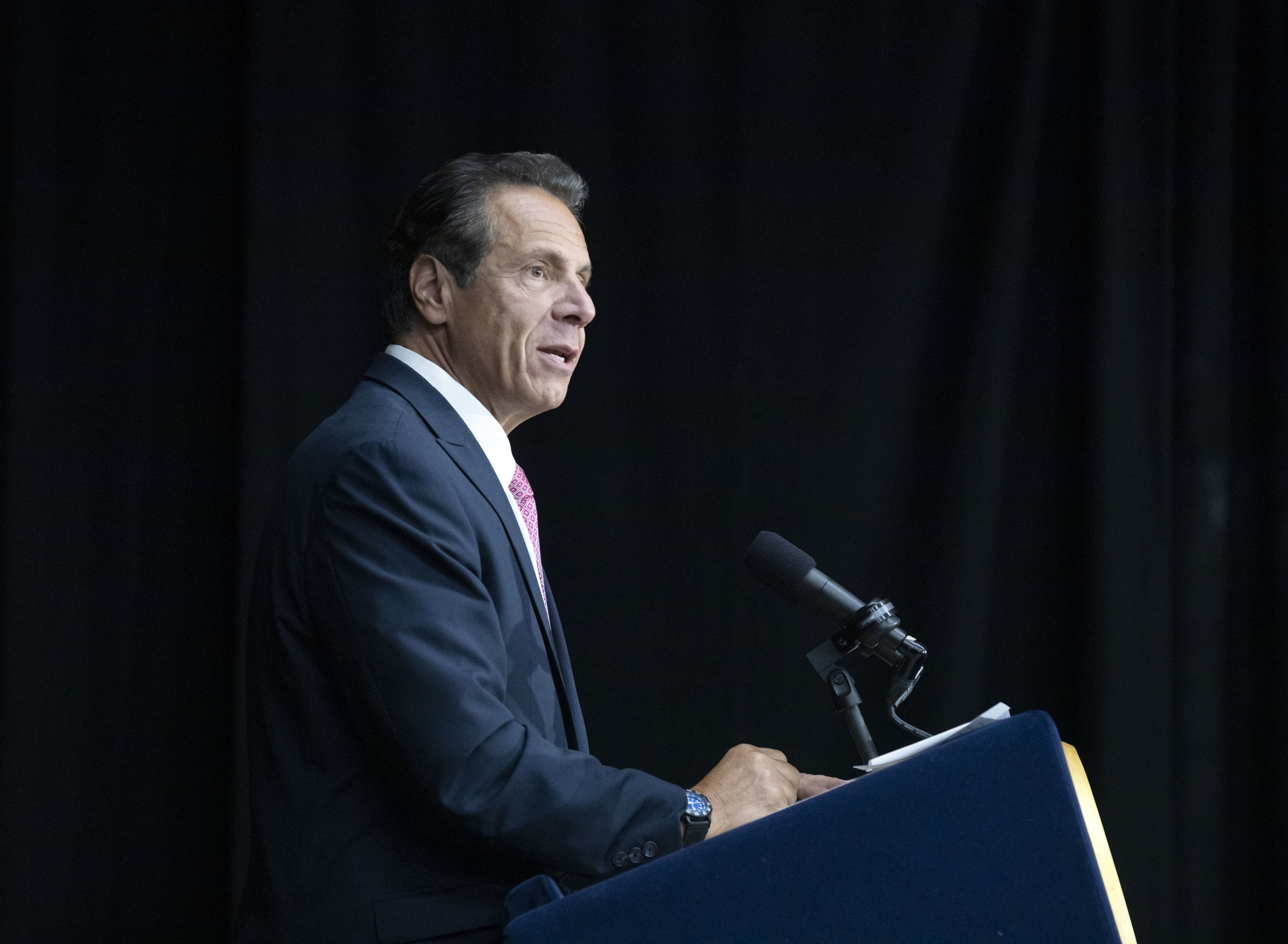Gov. Andrew Cuomo signed a law that would close a loophole that enabled predatory lenders to target thousands of small businesses. AP Photo.