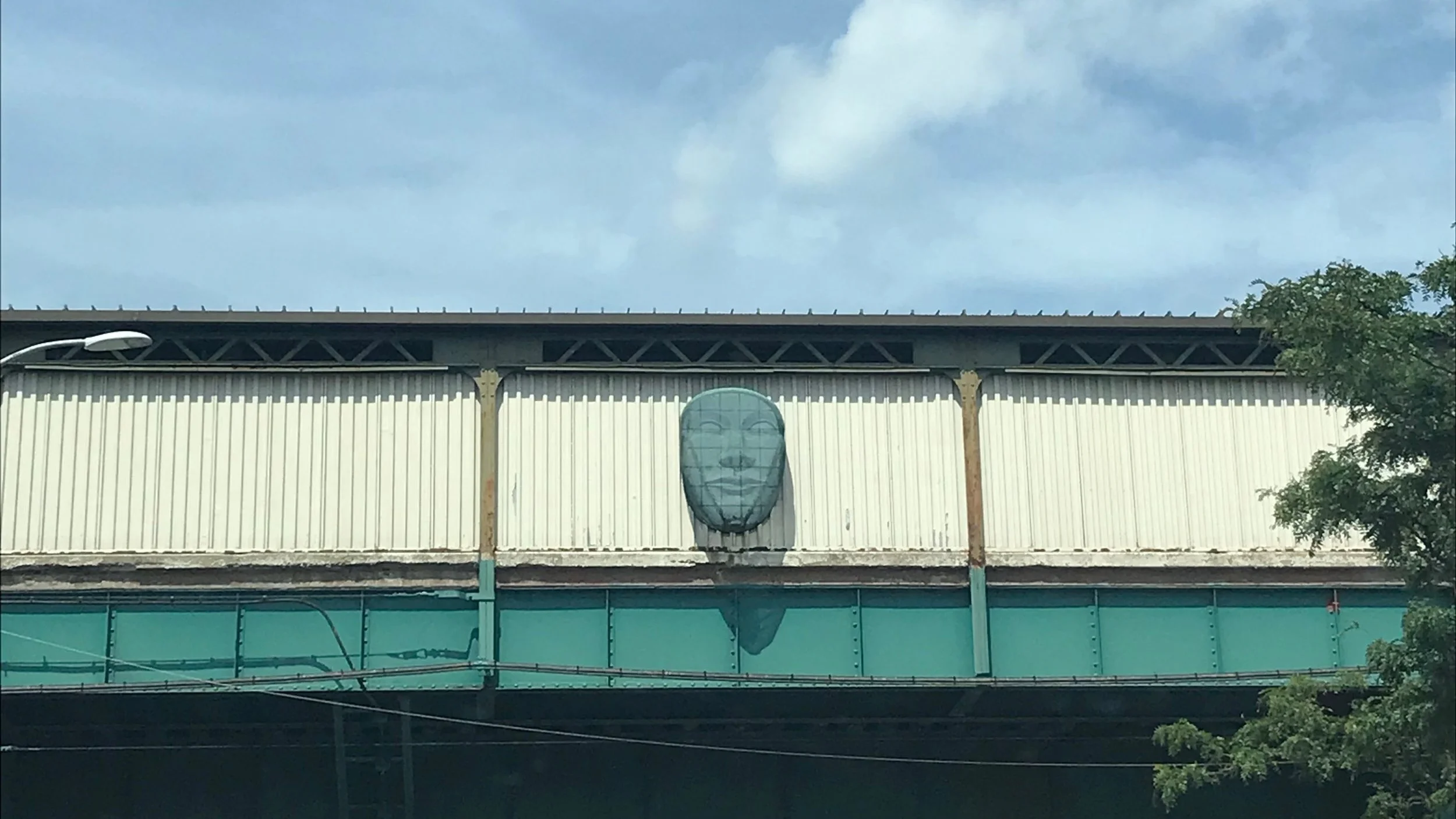 The story behind the faces that appear on five Queens and Brooklyn subway stations