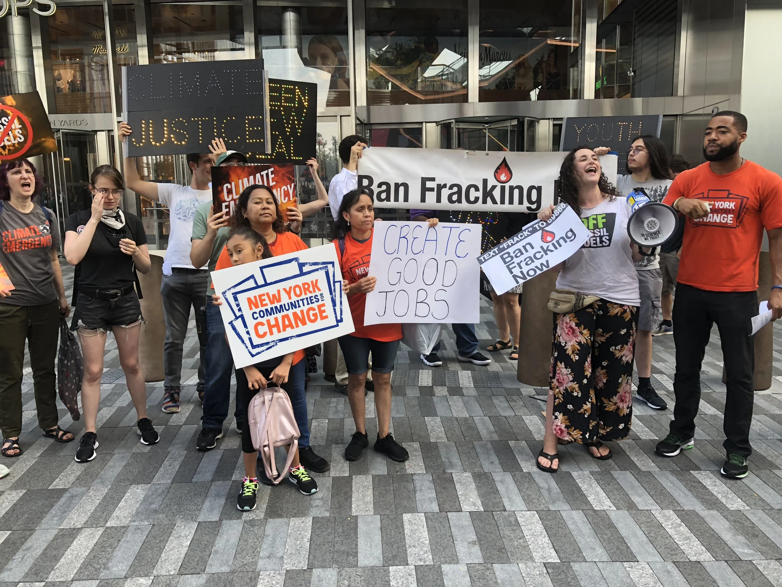 Protesters gathered near the foot of the Vessel structure to highlight issues around climate change. Eagle photo by Victoria Merlino.