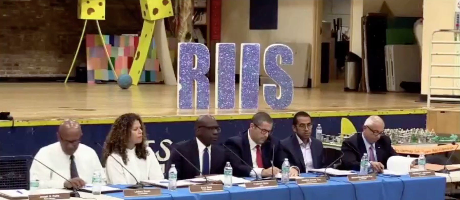 Members of the Civilian Complaint Review Board addressed community members at the Jacob Riis Settlement Neighborhood House in Long Island City on Sept. 12. Photo via the CCRB.