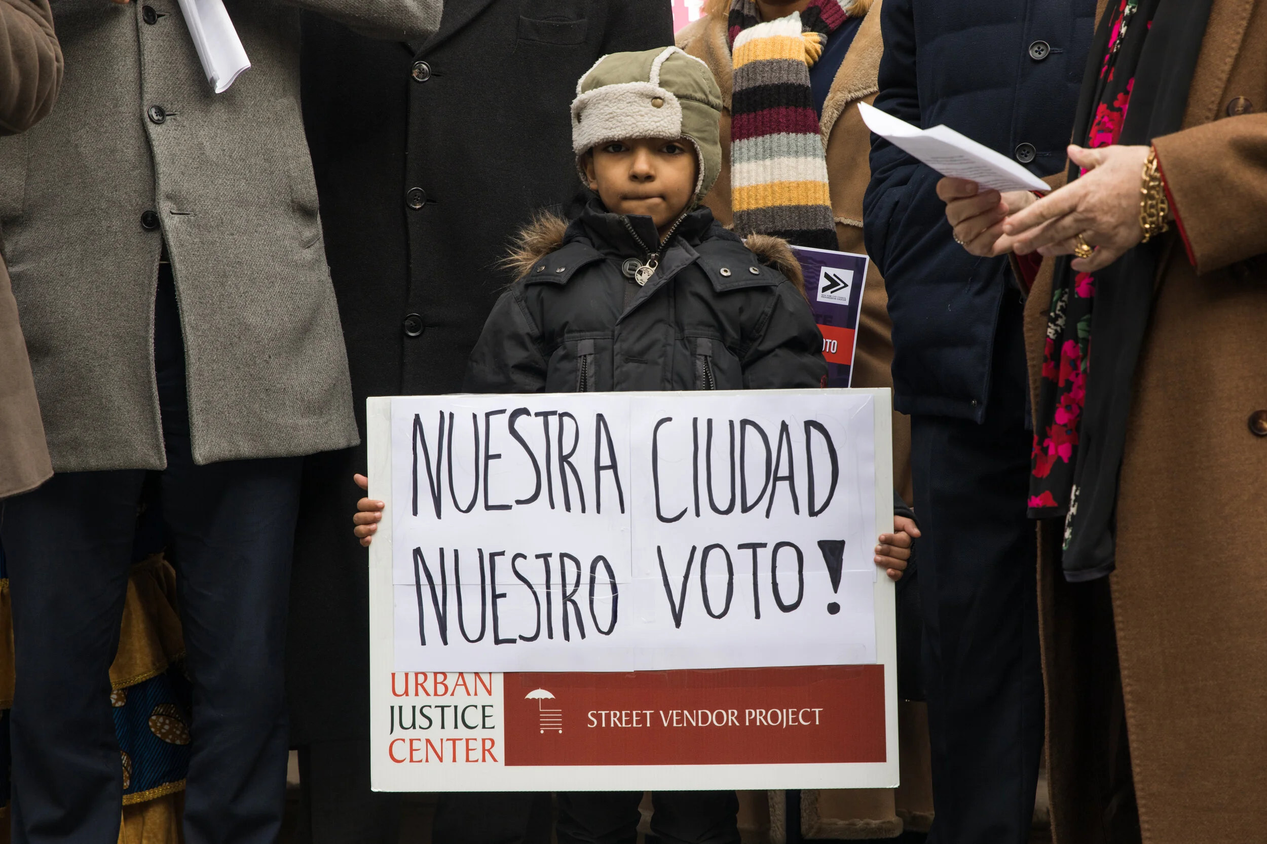 More than 100 immigrants and their advocates, including several councilmembers, rallied at City Hall to support a bill that would allow certain noncitizens to vote in municipal election.  Eagle  photo by Paul Frangipane.
