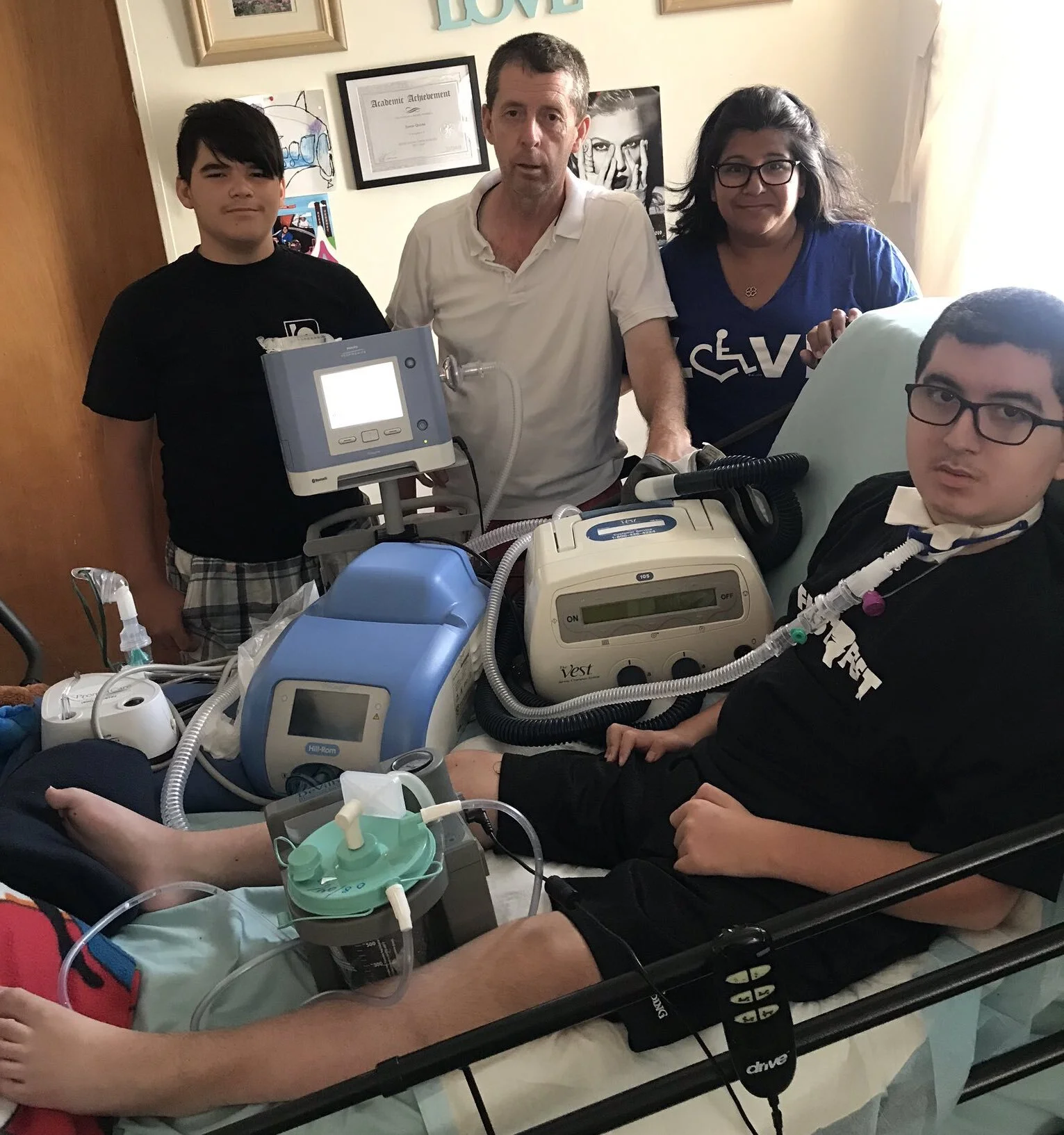 JUSTIN QUIRKE, 13, (FOREGROUND) WITH HIS YOUNGER BROTHER MATEO (LEFT), FATHER THOMAS (CENTER) AND MOTHER ALICIA. PHOTO COURTESY OF THE QUIRKE FAMILY