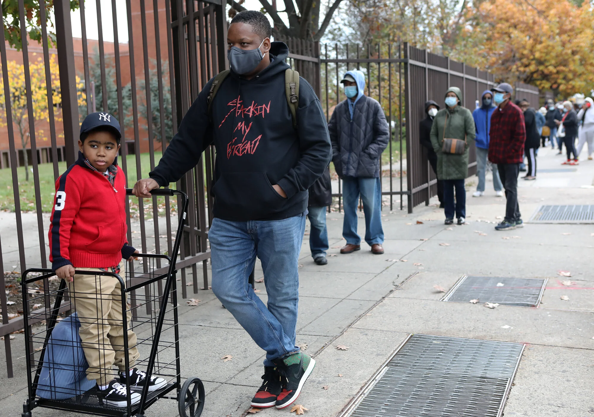 From Arverne to Astoria, 40,000 Queens voters brave chilly lines to cast early ballots