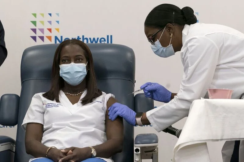 Queens nurse receives country's first COVID-19 vaccine