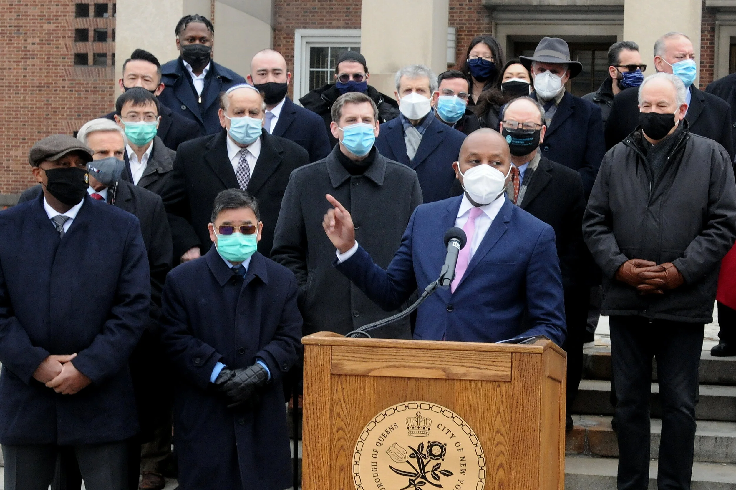 ‘We need to care for each other’ Queens leaders unite to fight ‘virus’ of racism