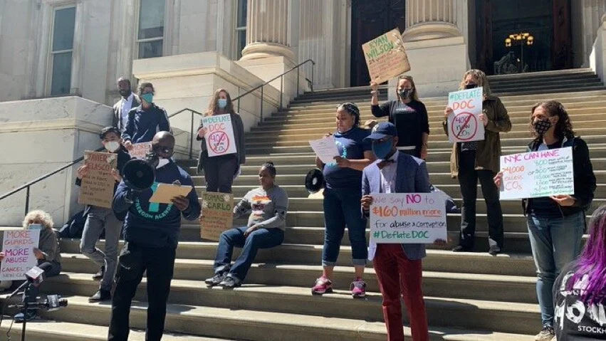 Activists rally for inmate rights in response to scathing Rikers review