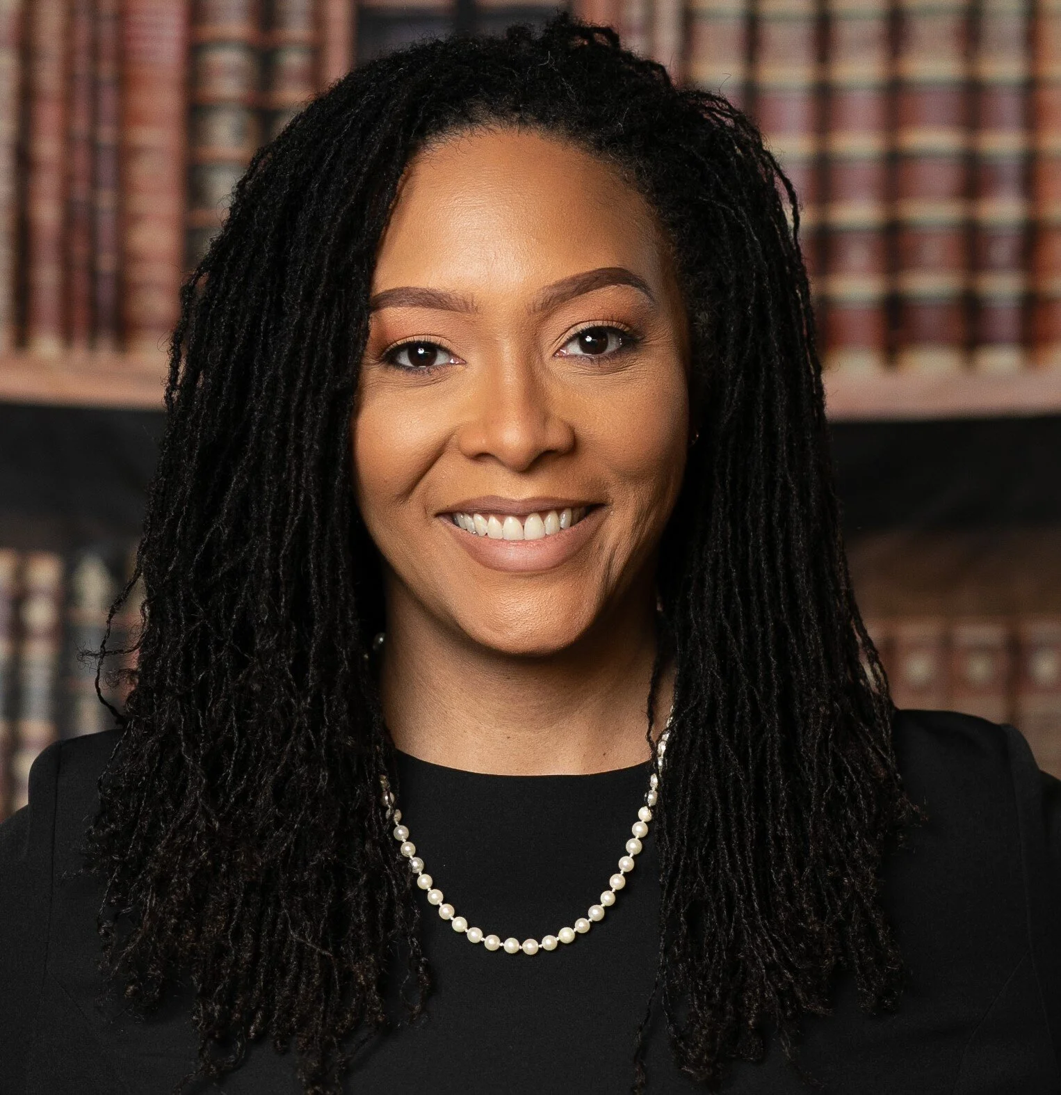 Judicial candidate commits to continued service to the Queens community