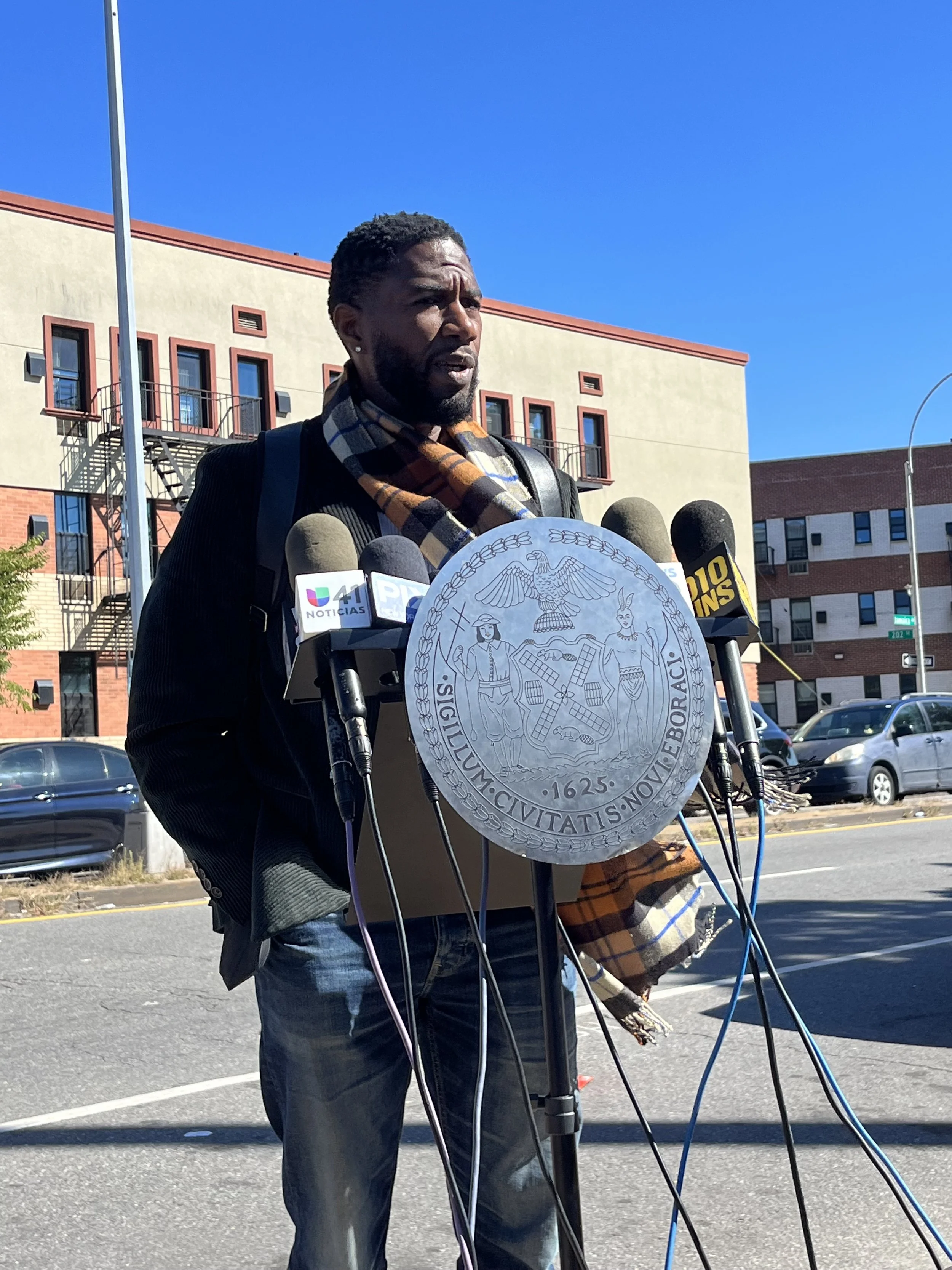 NYC officials visit Queens shelter where asylum seeker died