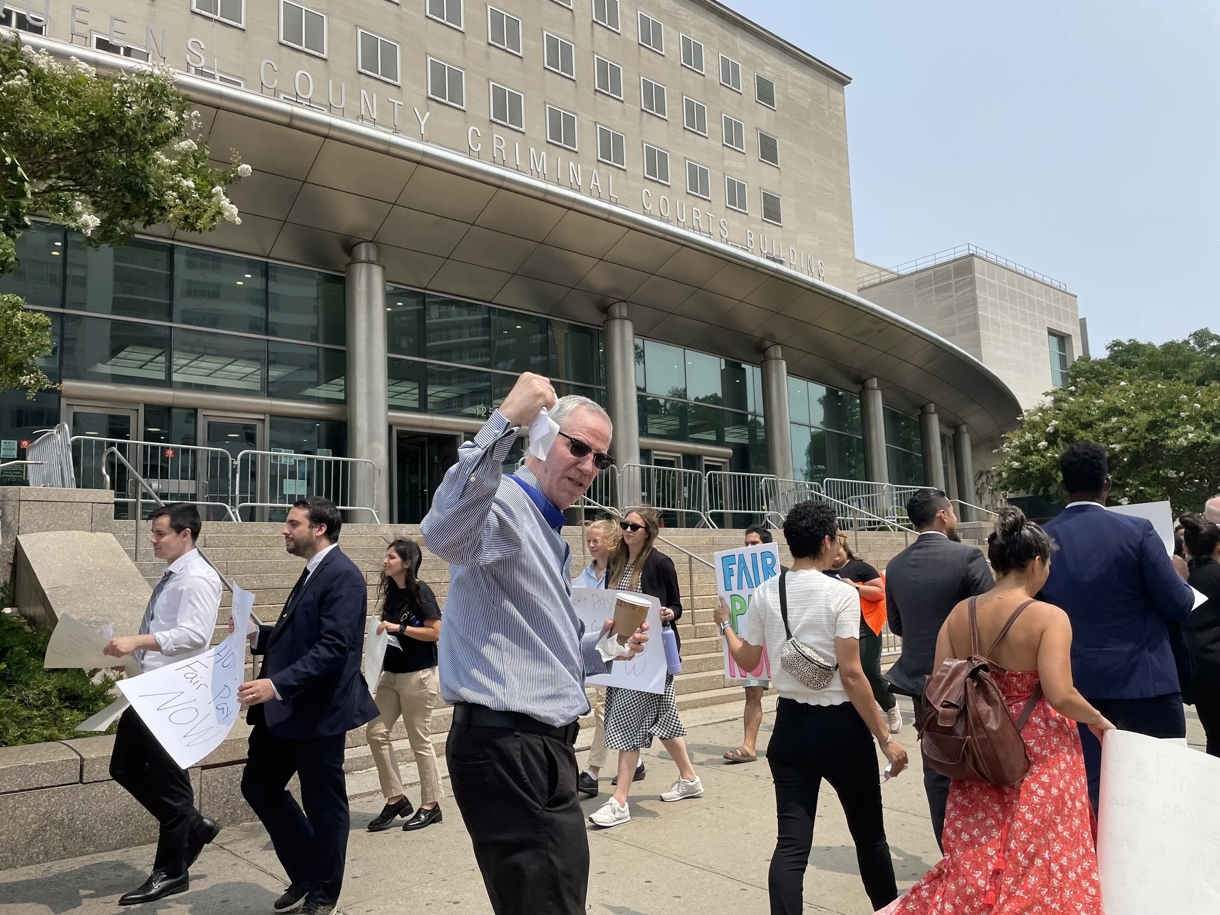 Public defenders call for better pay, case caps and transparent negotiations in Queens