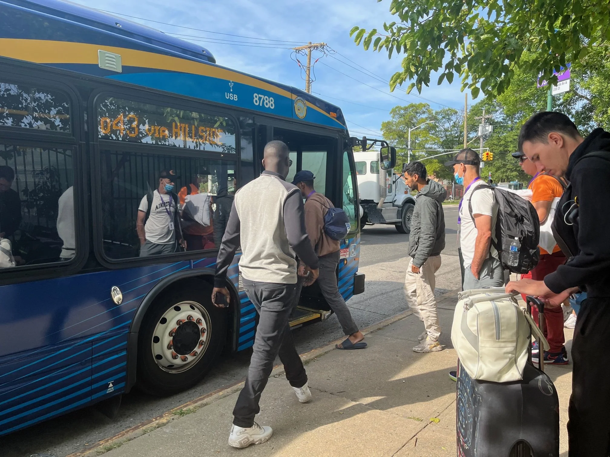 Welcome to Queens: Migrants share their experiences at Creedmoor shelter 