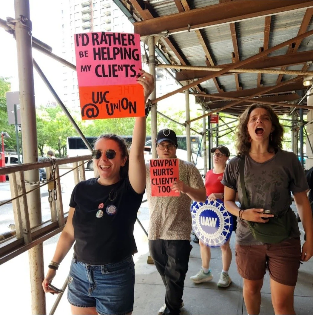 Threat of mass legal aid strikes averted, but picket lines persist