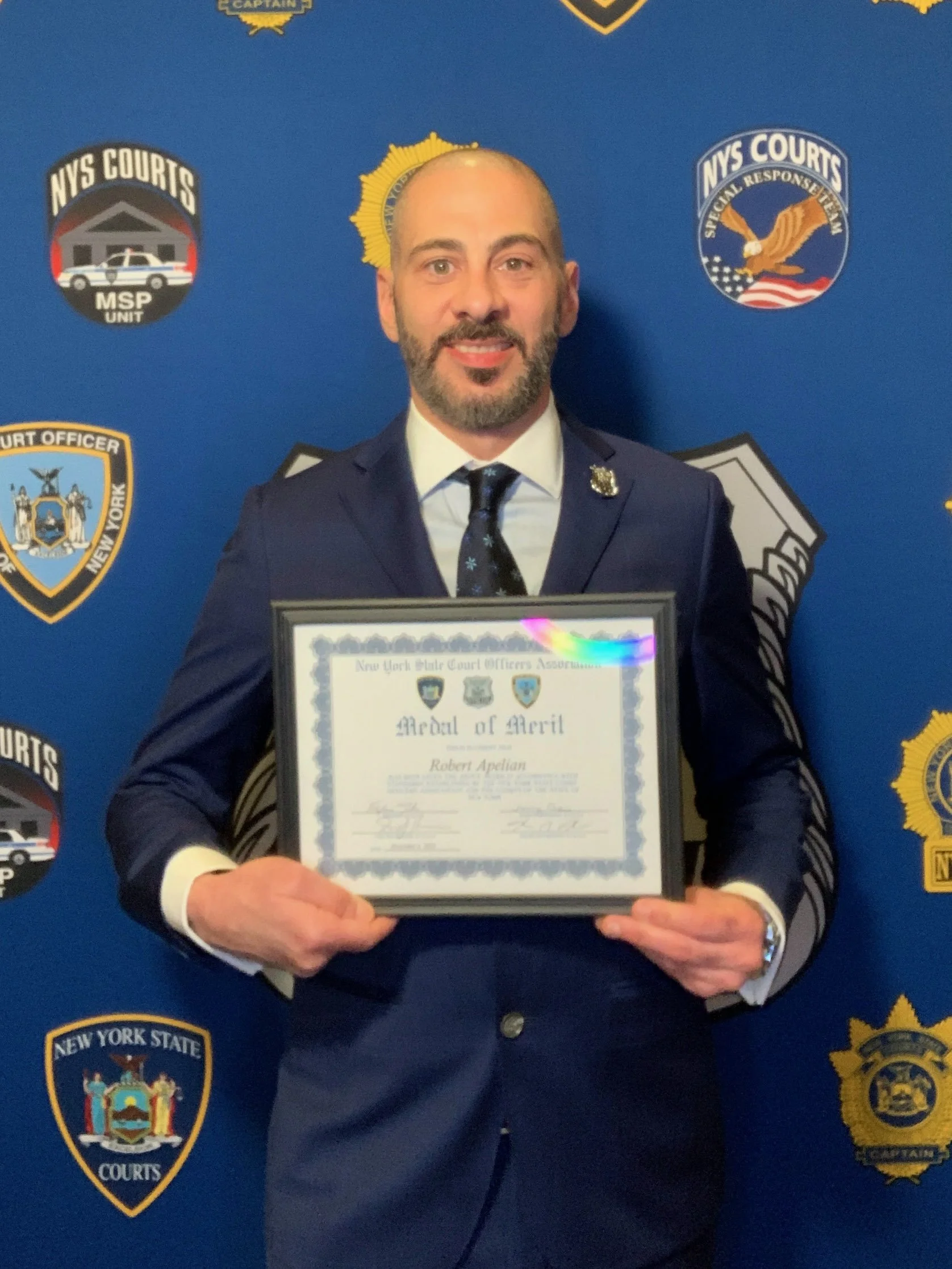 Queens court officer honored for discovering gun smuggled in court