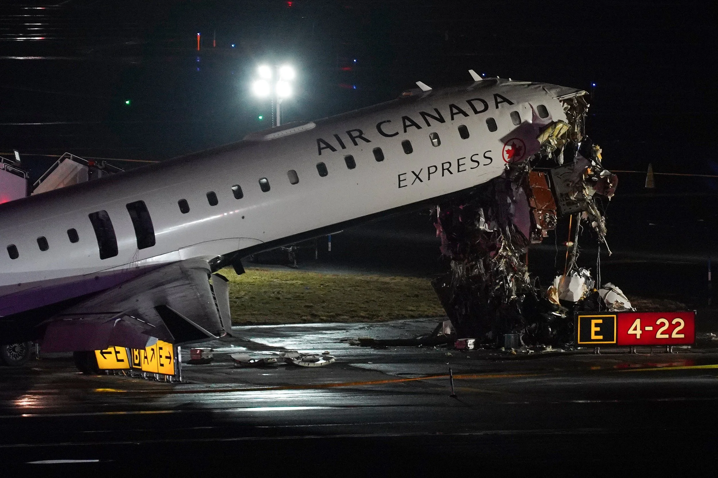 Pilots dead and dozens injured after plane crashes into firetruck on LaGuardia tarmac 