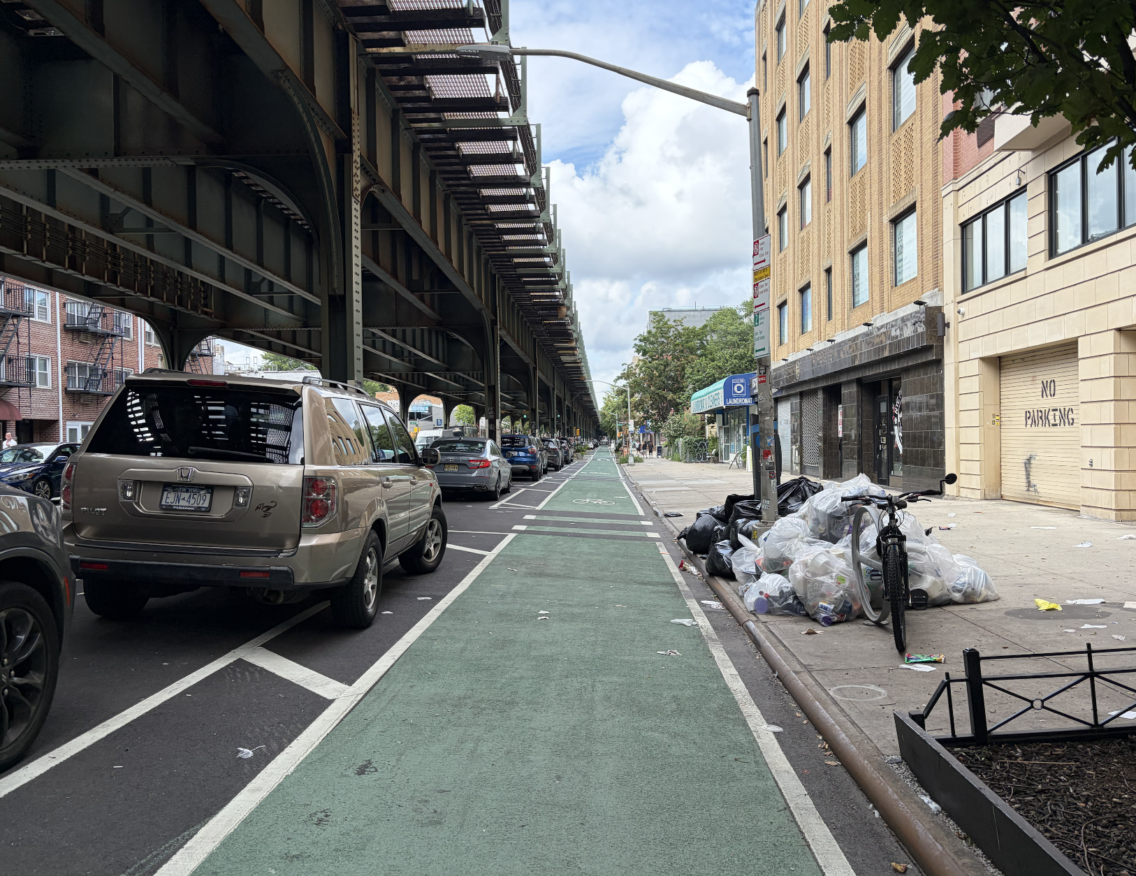 Locals celebrate opening of controversial Astoria bike lane as court battle continues 