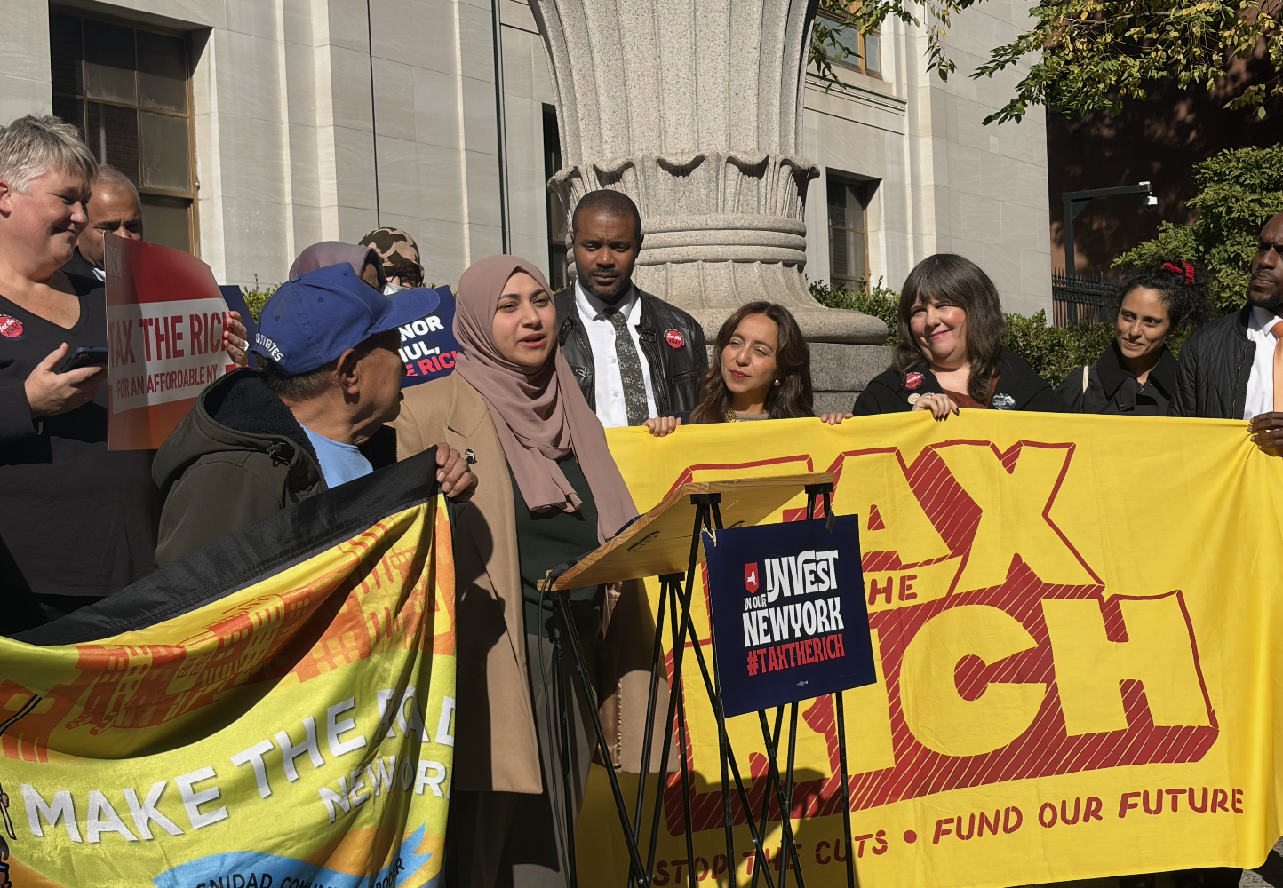 Queens lawmakers and advocates rally for pied-à-terre tax as appellate court hears case